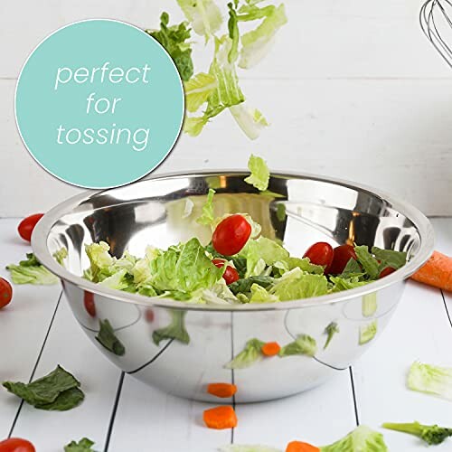 Stainless steel bowl with lettuce and tomatoes, perfect for tossing.